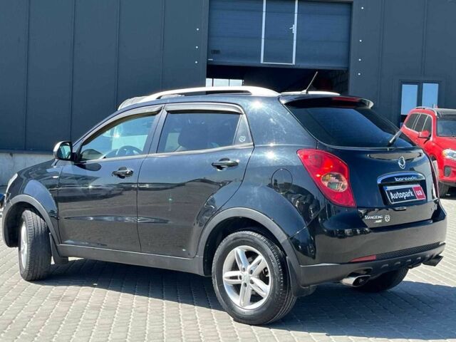 Чорний Cанг Йонг Korando, об'ємом двигуна 2 л та пробігом 208 тис. км за 6990 $, фото 15 на Automoto.ua