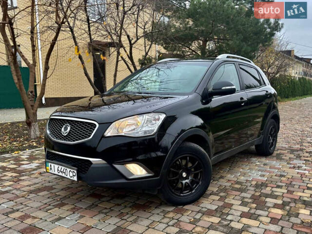 Черный Cанг Йонг Корандо, объемом двигателя 2 л и пробегом 168 тыс. км за 7200 $, фото 12 на Automoto.ua