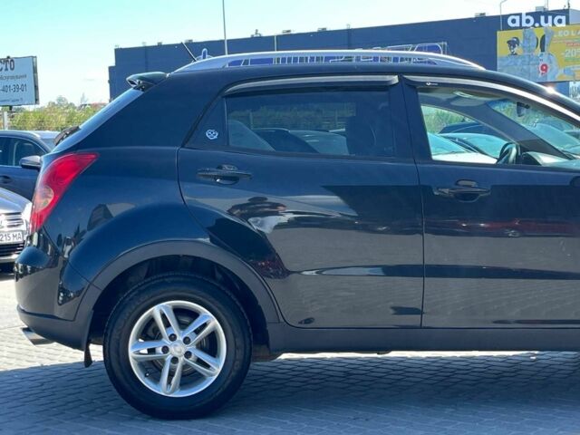 Чорний Cанг Йонг Korando, об'ємом двигуна 2 л та пробігом 208 тис. км за 7690 $, фото 12 на Automoto.ua