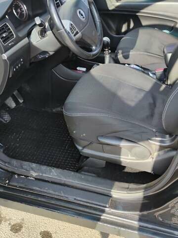 Чорний Cанг Йонг Korando, об'ємом двигуна 2 л та пробігом 218 тис. км за 7499 $, фото 11 на Automoto.ua