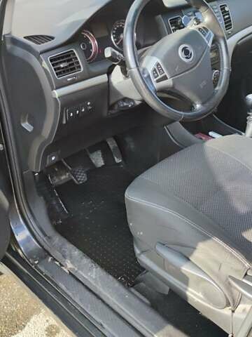 Чорний Cанг Йонг Korando, об'ємом двигуна 2 л та пробігом 216 тис. км за 7995 $, фото 23 на Automoto.ua