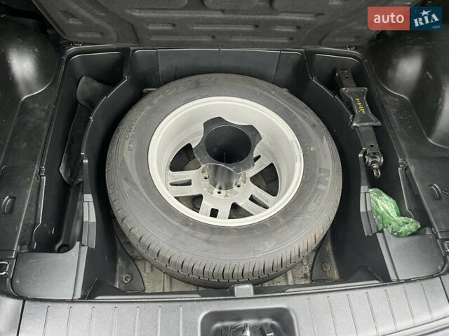 Черный Cанг Йонг Корандо, объемом двигателя 2 л и пробегом 168 тыс. км за 7200 $, фото 28 на Automoto.ua