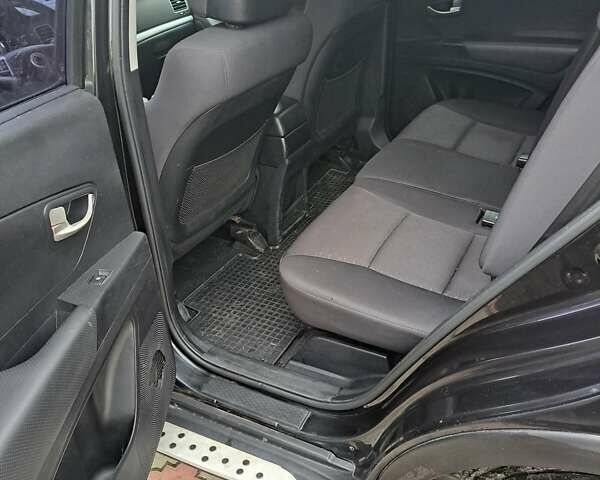 Черный Cанг Йонг Корандо, объемом двигателя 2 л и пробегом 138 тыс. км за 8800 $, фото 5 на Automoto.ua