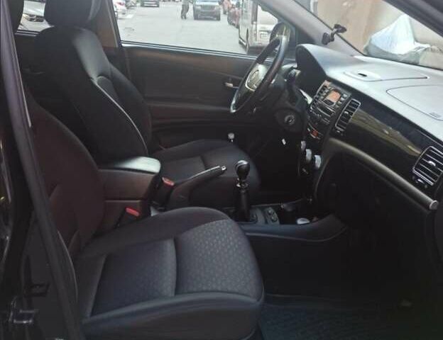 Черный Cанг Йонг Корандо, объемом двигателя 2 л и пробегом 194 тыс. км за 6000 $, фото 7 на Automoto.ua