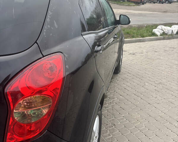 Черный Cанг Йонг Корандо, объемом двигателя 2 л и пробегом 168 тыс. км за 7900 $, фото 12 на Automoto.ua