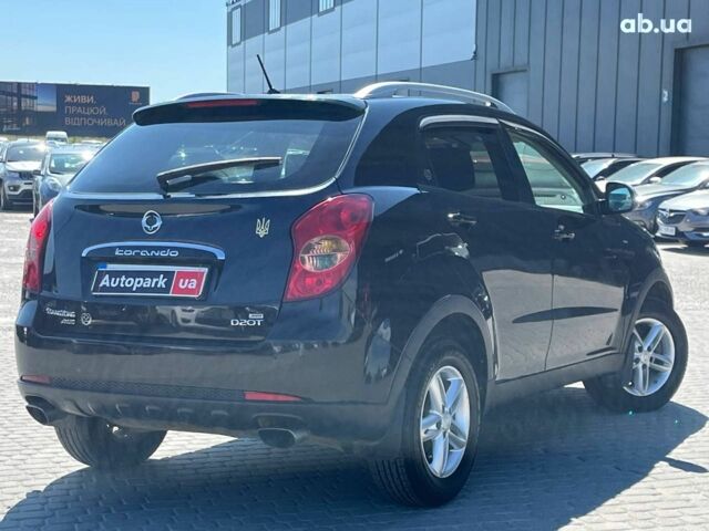 Чорний Cанг Йонг Korando, об'ємом двигуна 2 л та пробігом 208 тис. км за 7690 $, фото 3 на Automoto.ua