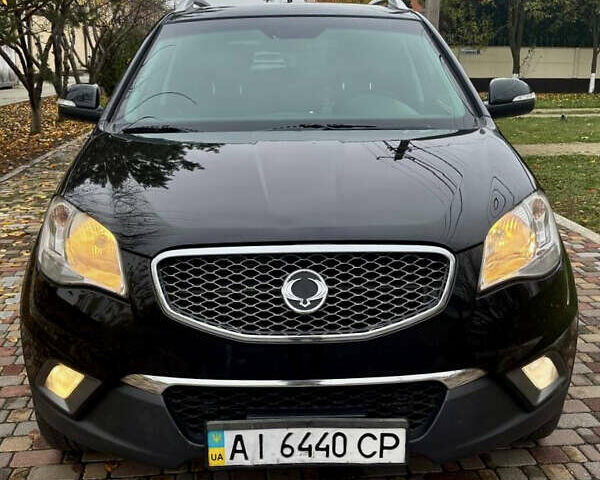 Черный Cанг Йонг Корандо, объемом двигателя 2 л и пробегом 168 тыс. км за 7200 $, фото 5 на Automoto.ua