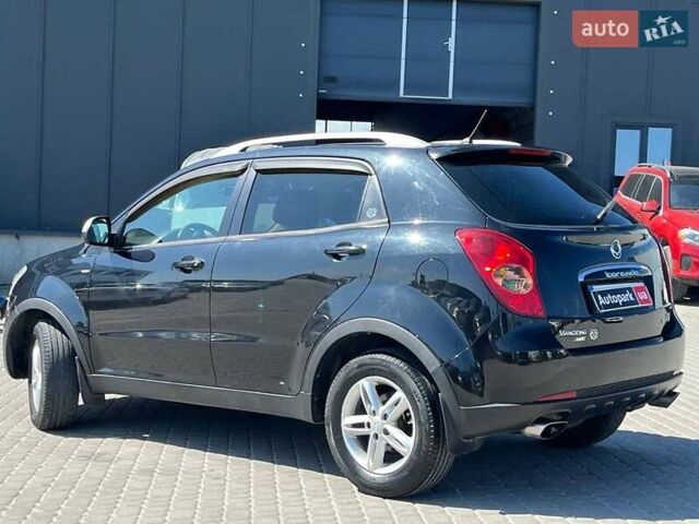 Чорний Cанг Йонг Korando, об'ємом двигуна 2 л та пробігом 208 тис. км за 7400 $, фото 15 на Automoto.ua
