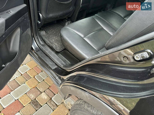 Черный Cанг Йонг Корандо, объемом двигателя 2 л и пробегом 168 тыс. км за 7200 $, фото 20 на Automoto.ua