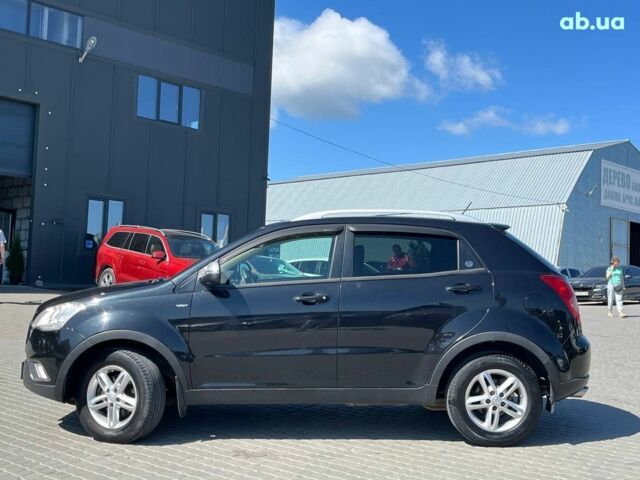 Чорний Cанг Йонг Korando, об'ємом двигуна 2 л та пробігом 208 тис. км за 7690 $, фото 8 на Automoto.ua