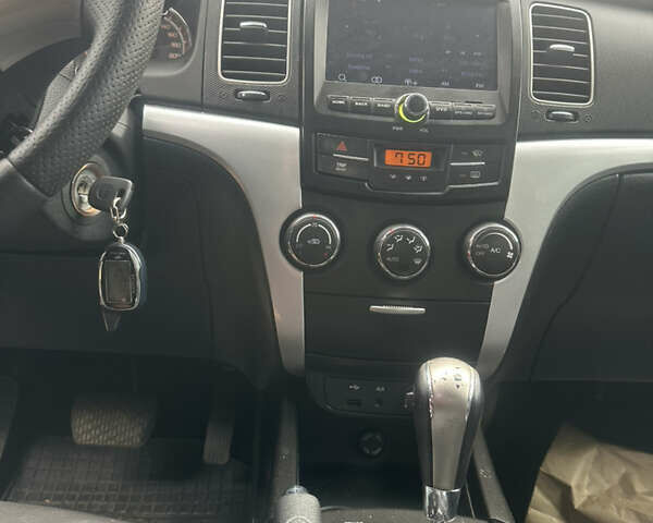 Чорний Cанг Йонг Korando, об'ємом двигуна 2 л та пробігом 138 тис. км за 6900 $, фото 11 на Automoto.ua