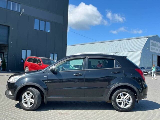 Чорний Cанг Йонг Korando, об'ємом двигуна 2 л та пробігом 208 тис. км за 6990 $, фото 8 на Automoto.ua