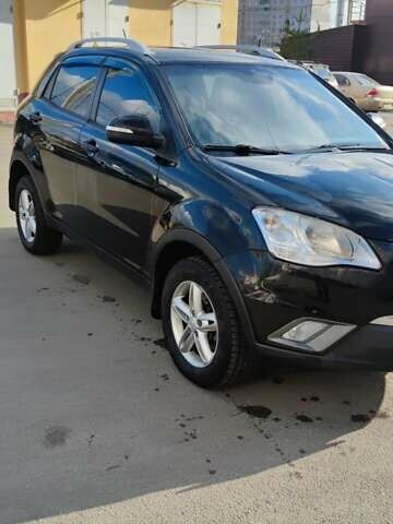 Чорний Cанг Йонг Korando, об'ємом двигуна 2 л та пробігом 216 тис. км за 7995 $, фото 31 на Automoto.ua