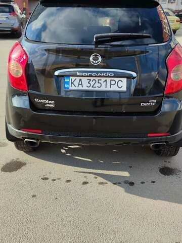Чорний Cанг Йонг Korando, об'ємом двигуна 2 л та пробігом 216 тис. км за 7995 $, фото 28 на Automoto.ua