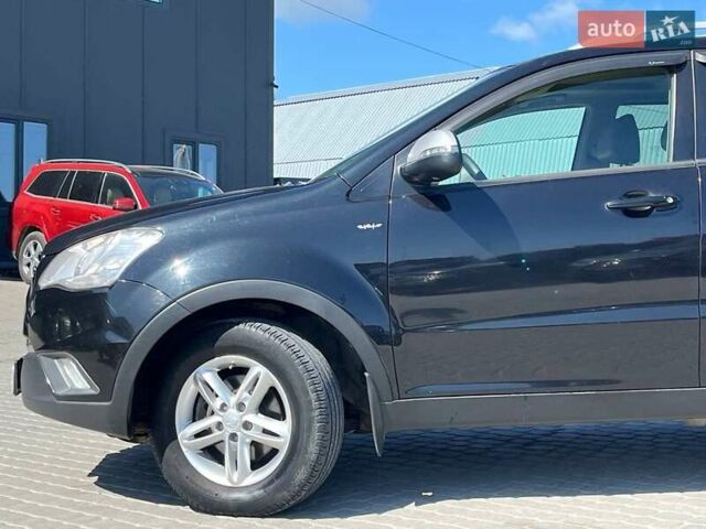 Чорний Cанг Йонг Korando, об'ємом двигуна 2 л та пробігом 208 тис. км за 7400 $, фото 20 на Automoto.ua