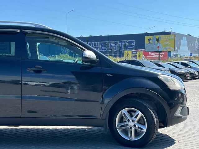 Чорний Cанг Йонг Korando, об'ємом двигуна 2 л та пробігом 208 тис. км за 6990 $, фото 11 на Automoto.ua