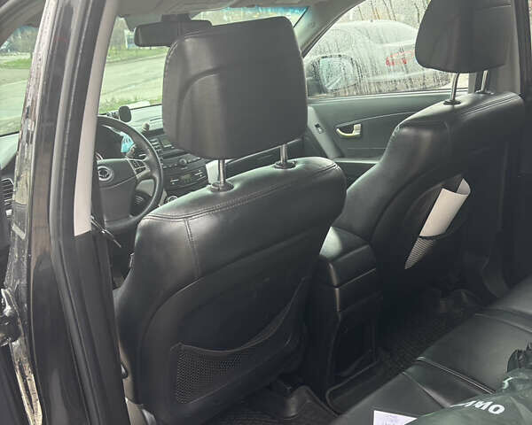 Черный Cанг Йонг Корандо, объемом двигателя 2 л и пробегом 168 тыс. км за 7900 $, фото 5 на Automoto.ua