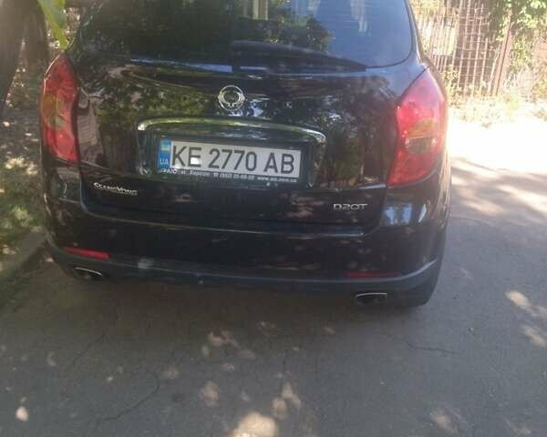 Черный Cанг Йонг Корандо, объемом двигателя 2 л и пробегом 194 тыс. км за 6000 $, фото 5 на Automoto.ua