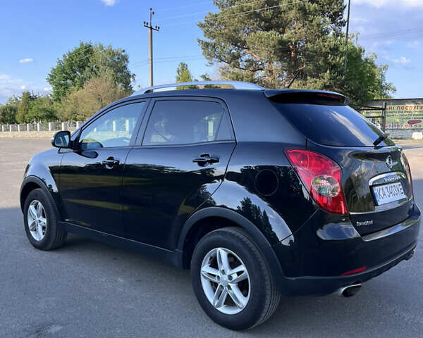 Чорний Cанг Йонг Korando, об'ємом двигуна 2 л та пробігом 190 тис. км за 8499 $, фото 6 на Automoto.ua