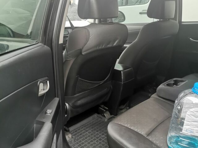 Черный Cанг Йонг Корандо, объемом двигателя 2 л и пробегом 350 тыс. км за 7000 $, фото 14 на Automoto.ua