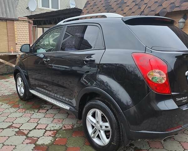 Черный Cанг Йонг Корандо, объемом двигателя 2 л и пробегом 138 тыс. км за 8800 $, фото 3 на Automoto.ua