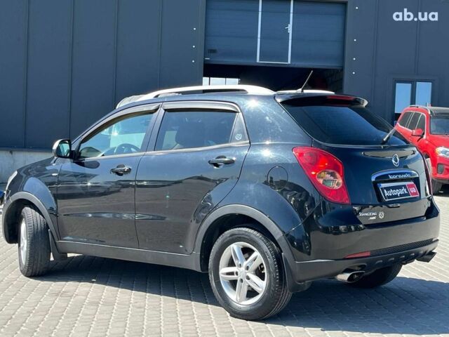 Чорний Cанг Йонг Korando, об'ємом двигуна 2 л та пробігом 208 тис. км за 7690 $, фото 15 на Automoto.ua
