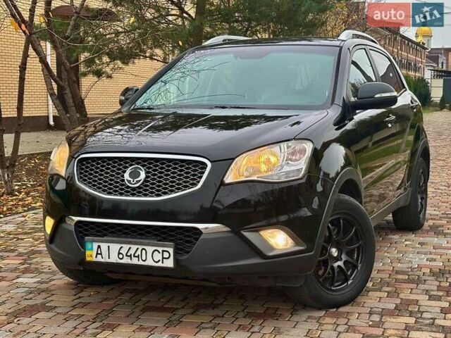 Черный Cанг Йонг Корандо, объемом двигателя 2 л и пробегом 168 тыс. км за 7200 $, фото 10 на Automoto.ua