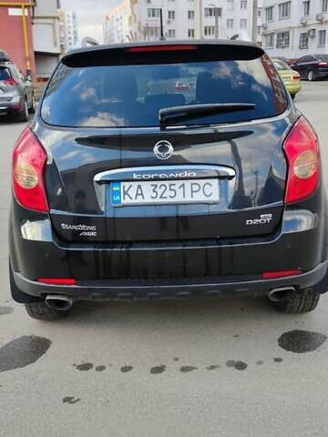 Чорний Cанг Йонг Korando, об'ємом двигуна 2 л та пробігом 216 тис. км за 7995 $, фото 5 на Automoto.ua