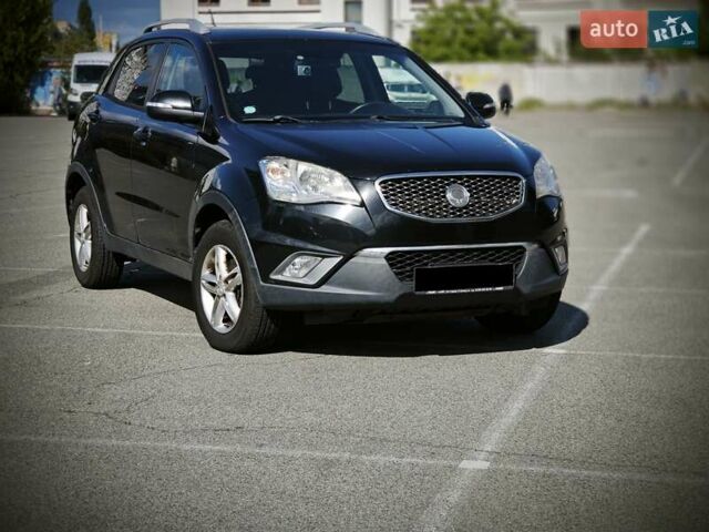 Чорний Cанг Йонг Korando, об'ємом двигуна 2 л та пробігом 170 тис. км за 9200 $, фото 7 на Automoto.ua