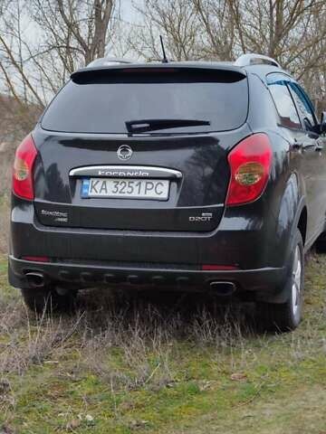 Чорний Cанг Йонг Korando, об'ємом двигуна 2 л та пробігом 218 тис. км за 7499 $, фото 35 на Automoto.ua