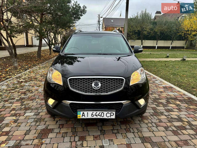 Черный Cанг Йонг Корандо, объемом двигателя 2 л и пробегом 168 тыс. км за 7200 $, фото 6 на Automoto.ua