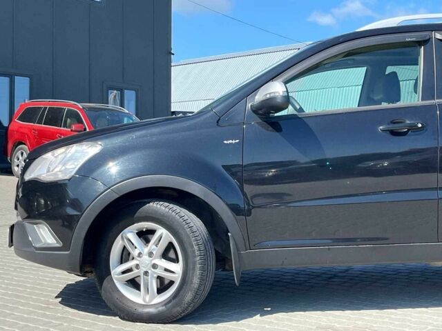 Чорний Cанг Йонг Korando, об'ємом двигуна 2 л та пробігом 208 тис. км за 6990 $, фото 20 на Automoto.ua