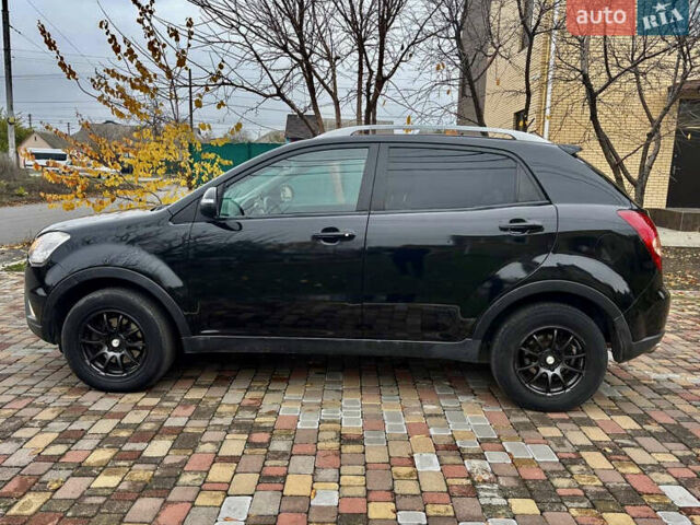 Черный Cанг Йонг Корандо, объемом двигателя 2 л и пробегом 168 тыс. км за 7200 $, фото 17 на Automoto.ua