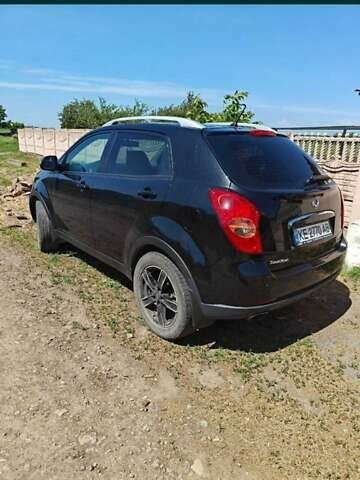 Черный Cанг Йонг Корандо, объемом двигателя 2 л и пробегом 194 тыс. км за 6000 $, фото 11 на Automoto.ua