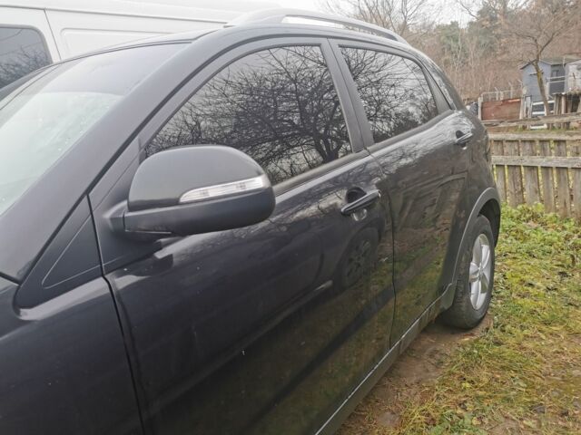 Черный Cанг Йонг Корандо, объемом двигателя 2 л и пробегом 350 тыс. км за 7000 $, фото 16 на Automoto.ua