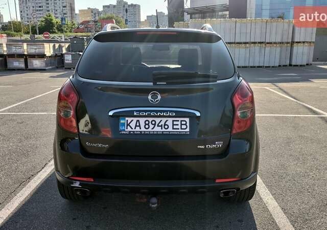 Черный Cанг Йонг Корандо, объемом двигателя 2 л и пробегом 168 тыс. км за 9099 $, фото 4 на Automoto.ua
