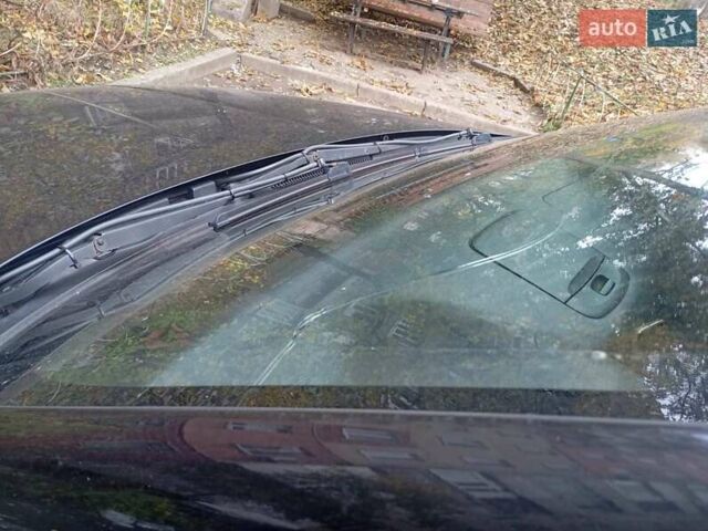 Черный Cанг Йонг Корандо, объемом двигателя 2 л и пробегом 176 тыс. км за 8500 $, фото 11 на Automoto.ua