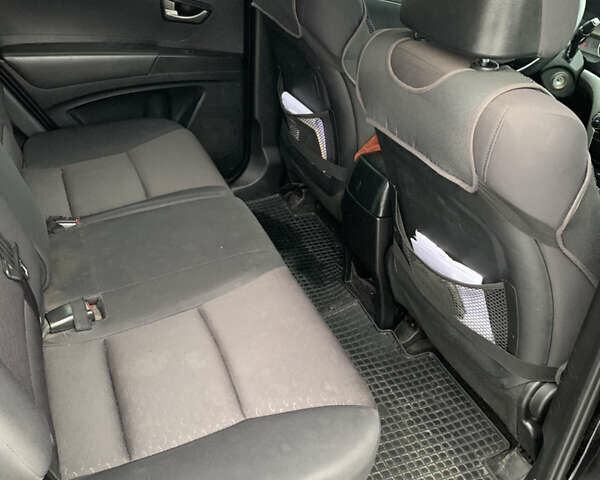 Чорний Cанг Йонг Korando, об'ємом двигуна 2 л та пробігом 260 тис. км за 9600 $, фото 4 на Automoto.ua