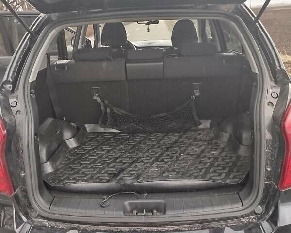 Чорний Cанг Йонг Korando, об'ємом двигуна 2 л та пробігом 130 тис. км за 10000 $, фото 9 на Automoto.ua