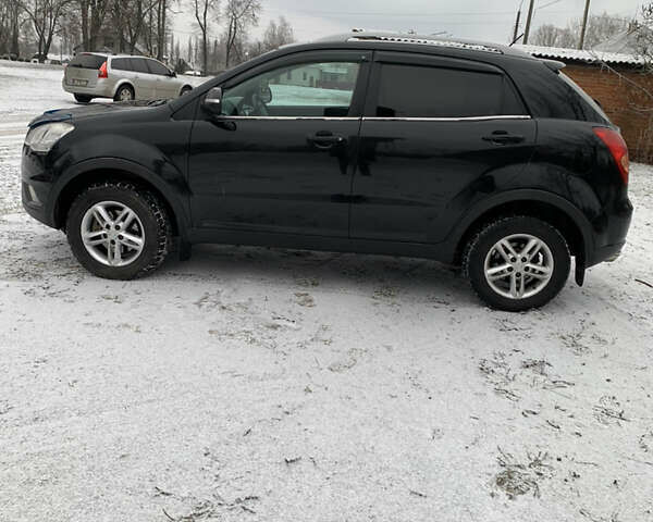 Чорний Cанг Йонг Korando, об'ємом двигуна 2 л та пробігом 260 тис. км за 9600 $, фото 8 на Automoto.ua