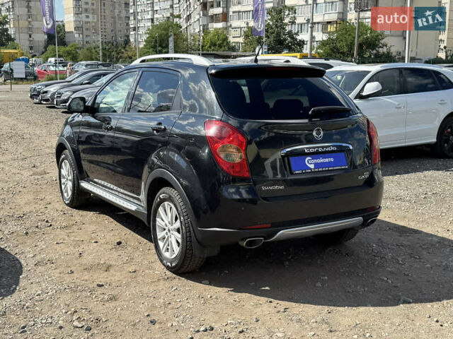 Черный Cанг Йонг Корандо, объемом двигателя 2 л и пробегом 169 тыс. км за 8900 $, фото 6 на Automoto.ua