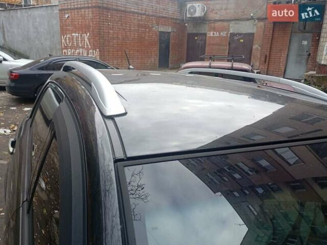 Черный Cанг Йонг Корандо, объемом двигателя 2 л и пробегом 176 тыс. км за 8500 $, фото 10 на Automoto.ua