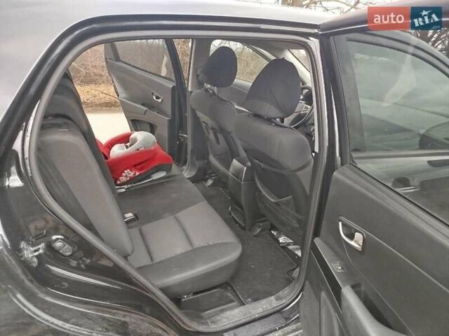 Чорний Cанг Йонг Korando, об'ємом двигуна 2 л та пробігом 130 тис. км за 10000 $, фото 8 на Automoto.ua
