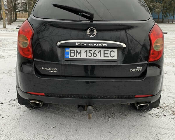Чорний Cанг Йонг Korando, об'ємом двигуна 2 л та пробігом 260 тис. км за 9600 $, фото 6 на Automoto.ua
