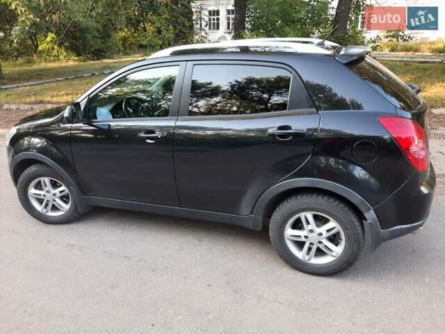 Чорний Cанг Йонг Korando, об'ємом двигуна 2 л та пробігом 149 тис. км за 6999 $, фото 3 на Automoto.ua