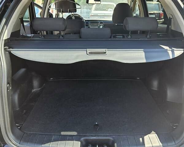Чорний Cанг Йонг Korando, об'ємом двигуна 2 л та пробігом 182 тис. км за 8500 $, фото 4 на Automoto.ua