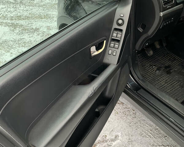 Чорний Cанг Йонг Korando, об'ємом двигуна 2 л та пробігом 260 тис. км за 9600 $, фото 11 на Automoto.ua