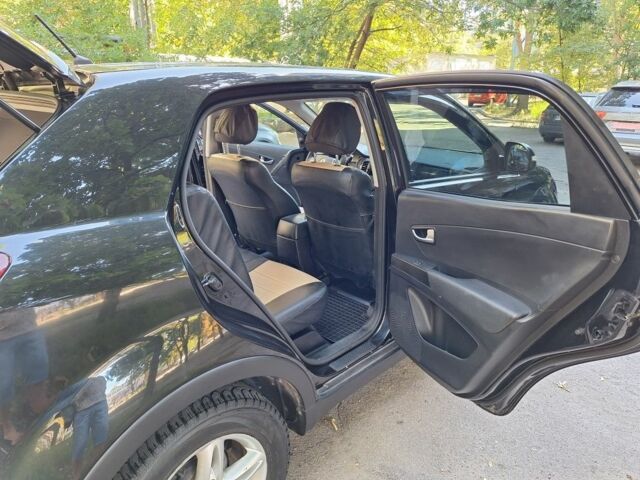 Чорний Cанг Йонг Korando, об'ємом двигуна 2 л та пробігом 41 тис. км за 10300 $, фото 10 на Automoto.ua