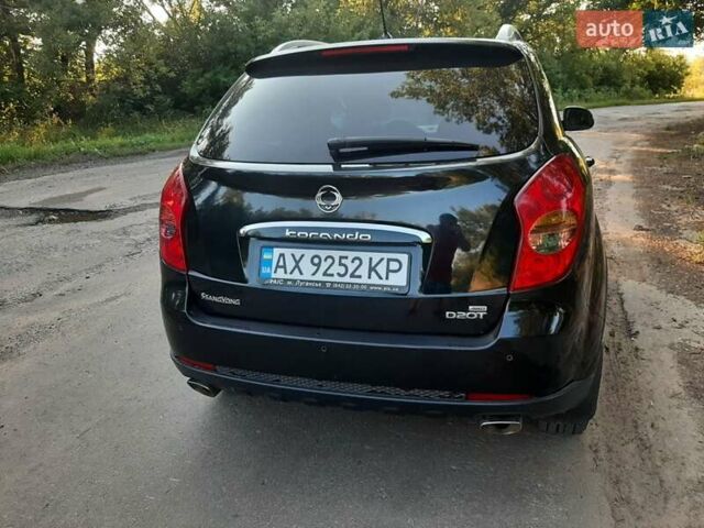 Чорний Cанг Йонг Korando, об'ємом двигуна 2 л та пробігом 149 тис. км за 6999 $, фото 5 на Automoto.ua