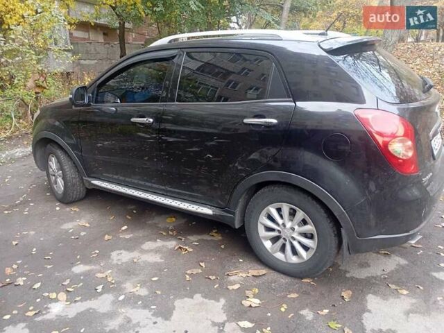 Черный Cанг Йонг Корандо, объемом двигателя 2 л и пробегом 176 тыс. км за 8500 $, фото 3 на Automoto.ua